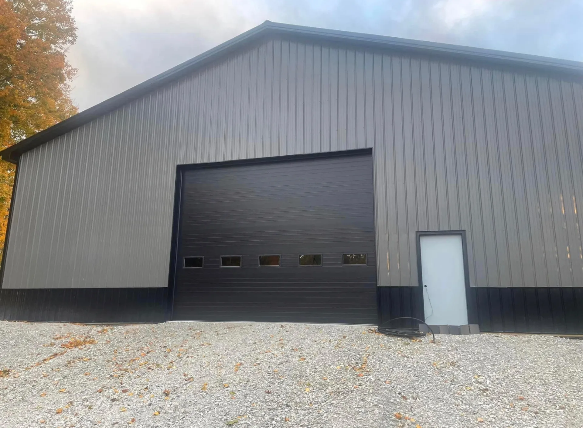 Large commercial overhead door on an industrial pole-barn facility