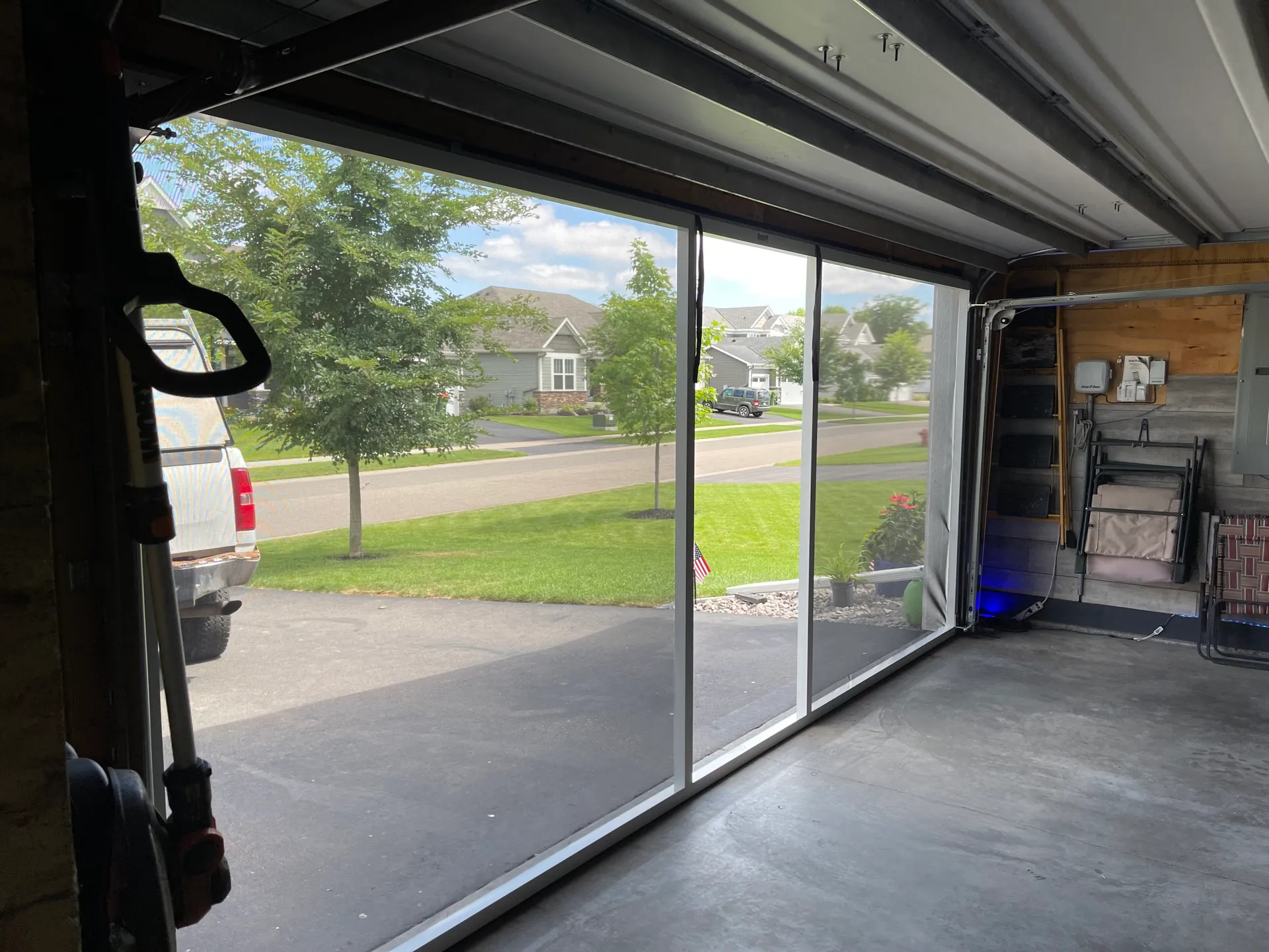 Interior view of a completed Lifestyle Screen installation looking out to the driveway